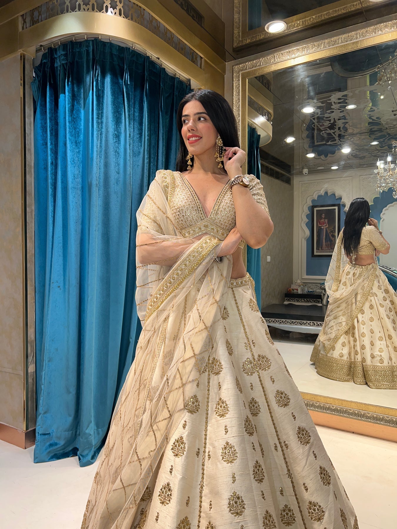 adorable off white floral motif embroidered lehenga set