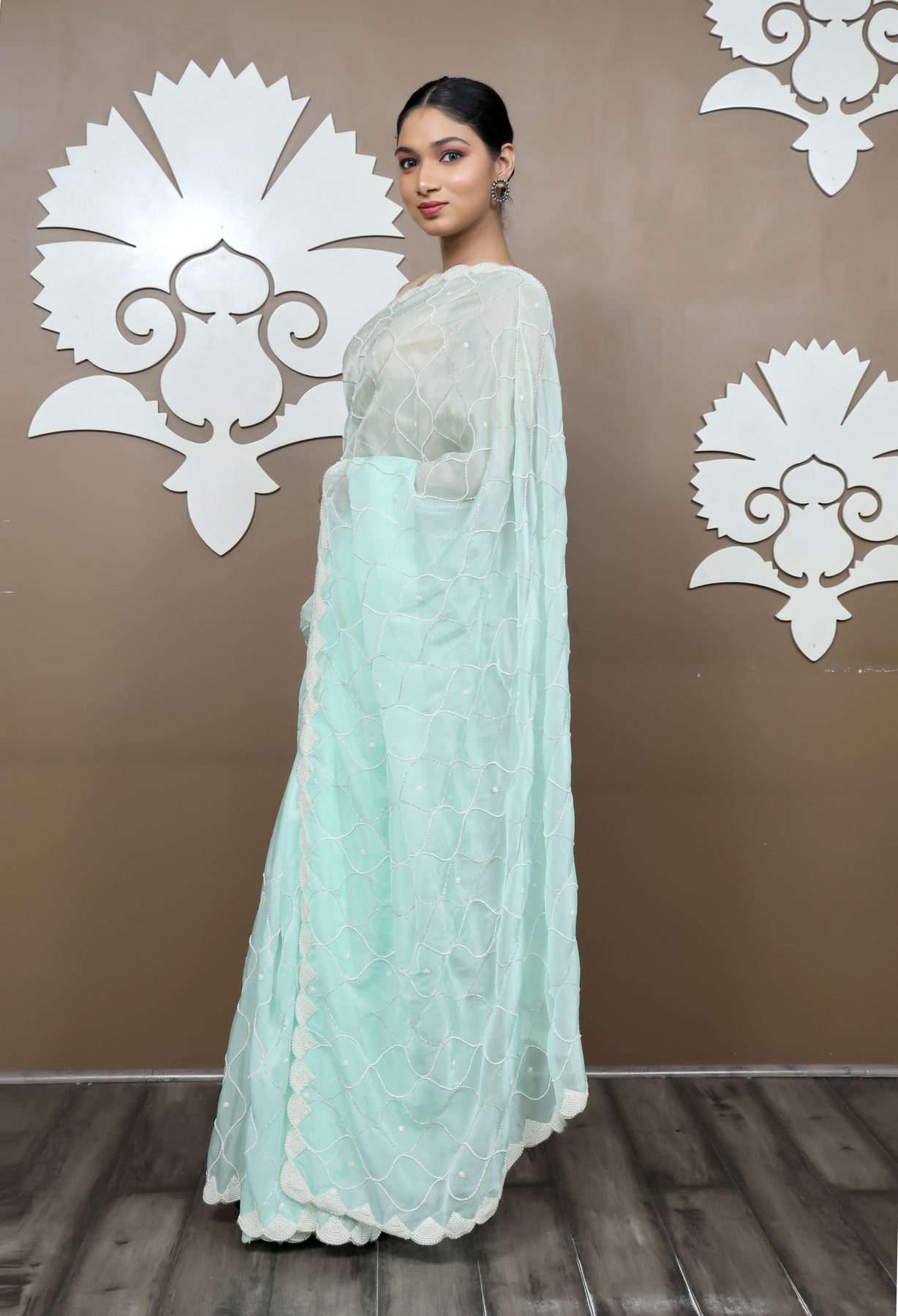 Elegant Aqua Color Geometrical Motif Embroidered Saree