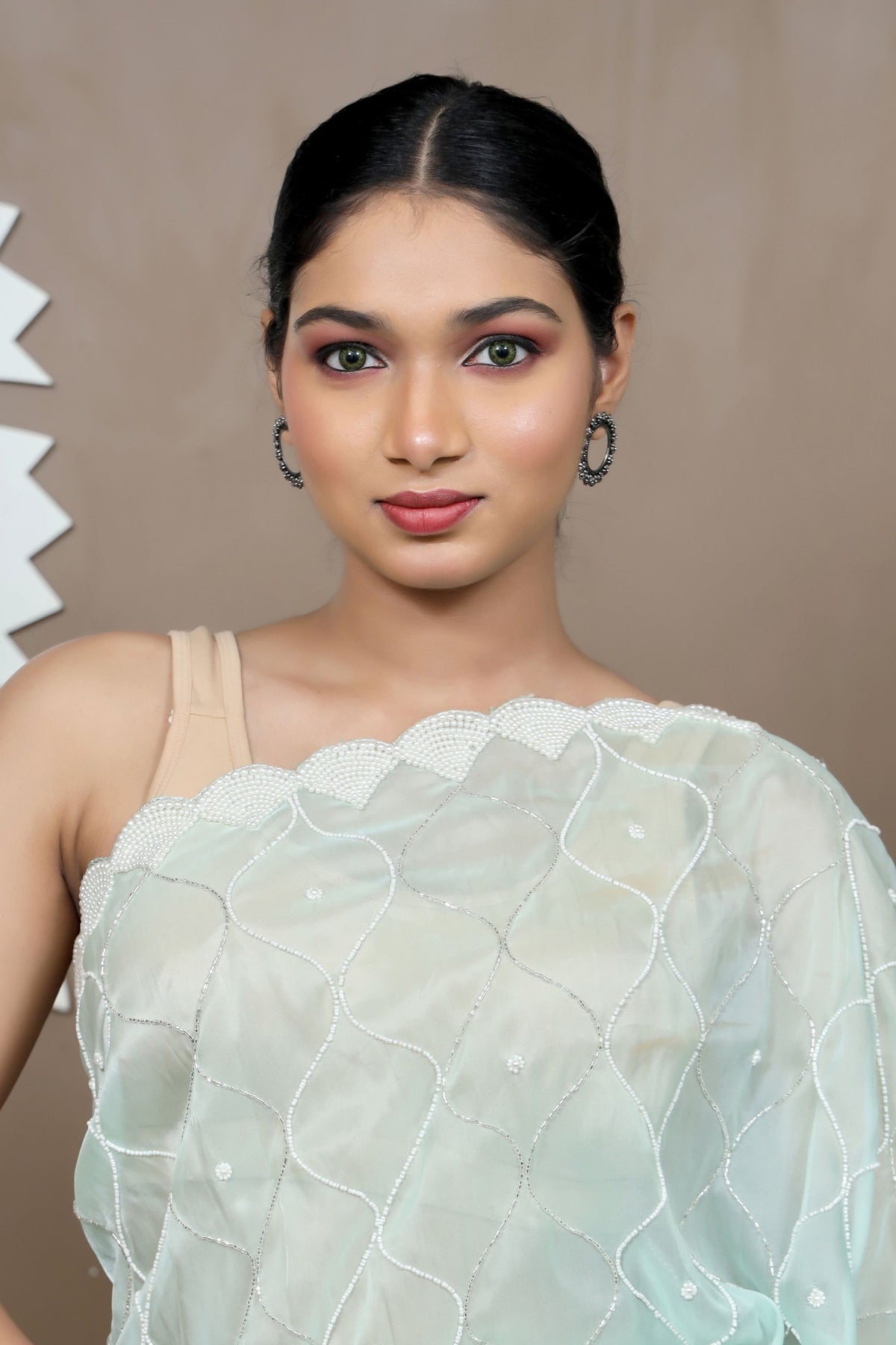 Elegant Aqua Color Geometrical Motif Embroidered Saree