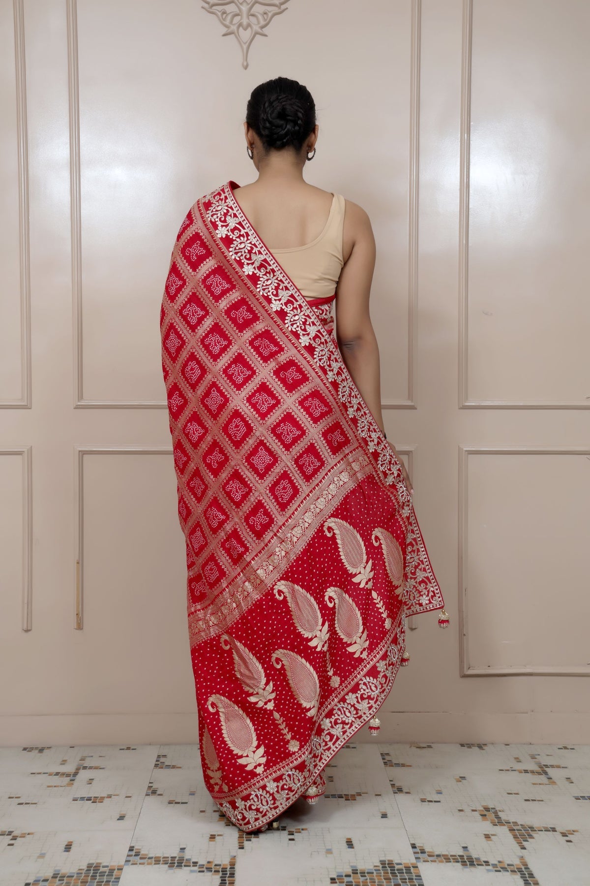 classy red color check with floral motif saree