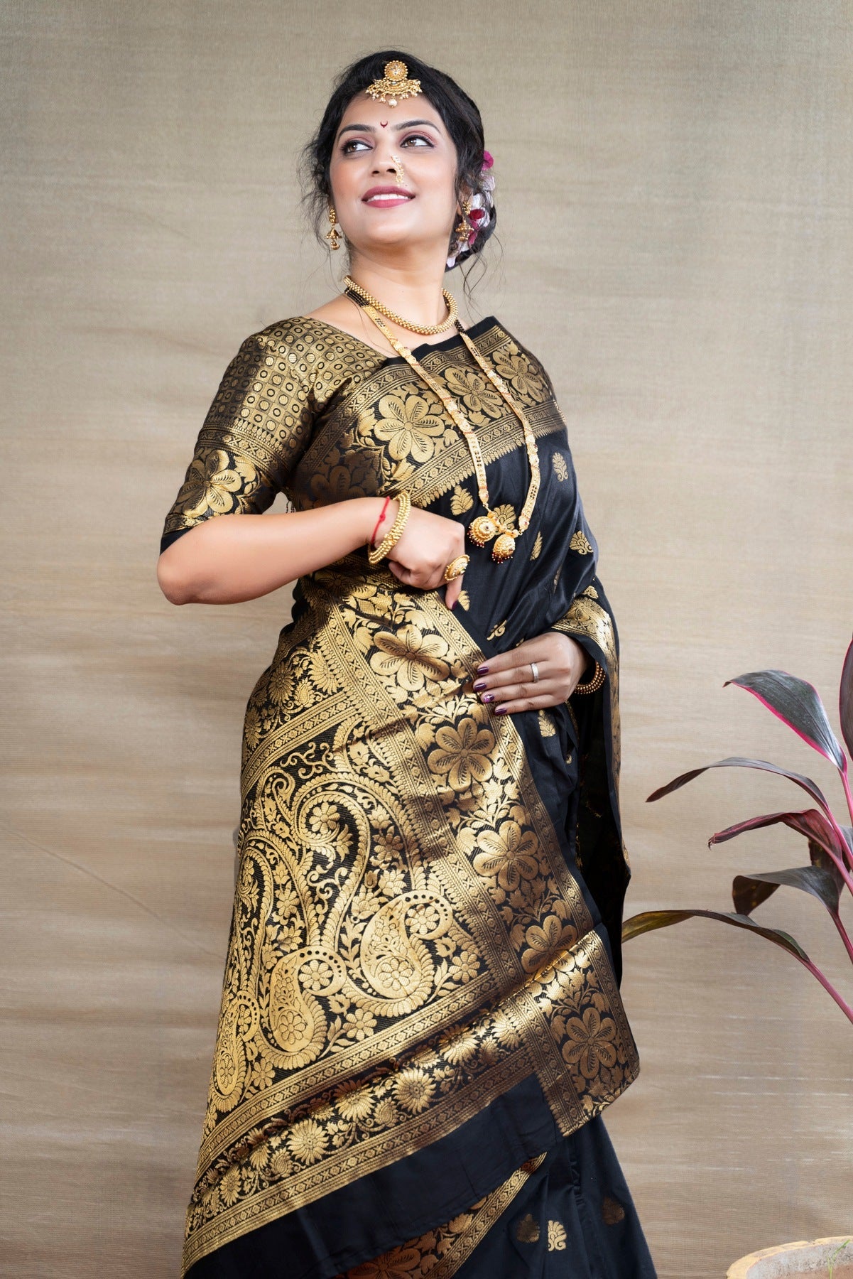 Delightful Black Banarasi Silk Saree With Assemblage Blouse Piece
