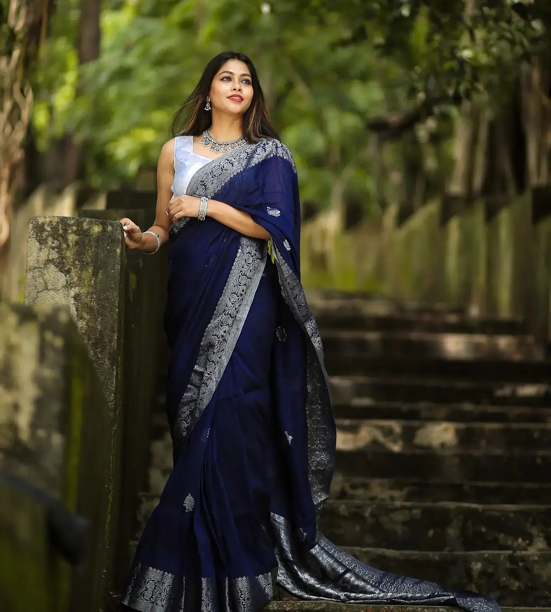 Charming Navy Blue Soft Banarasi Silk Saree With Glowing Blouse Piece