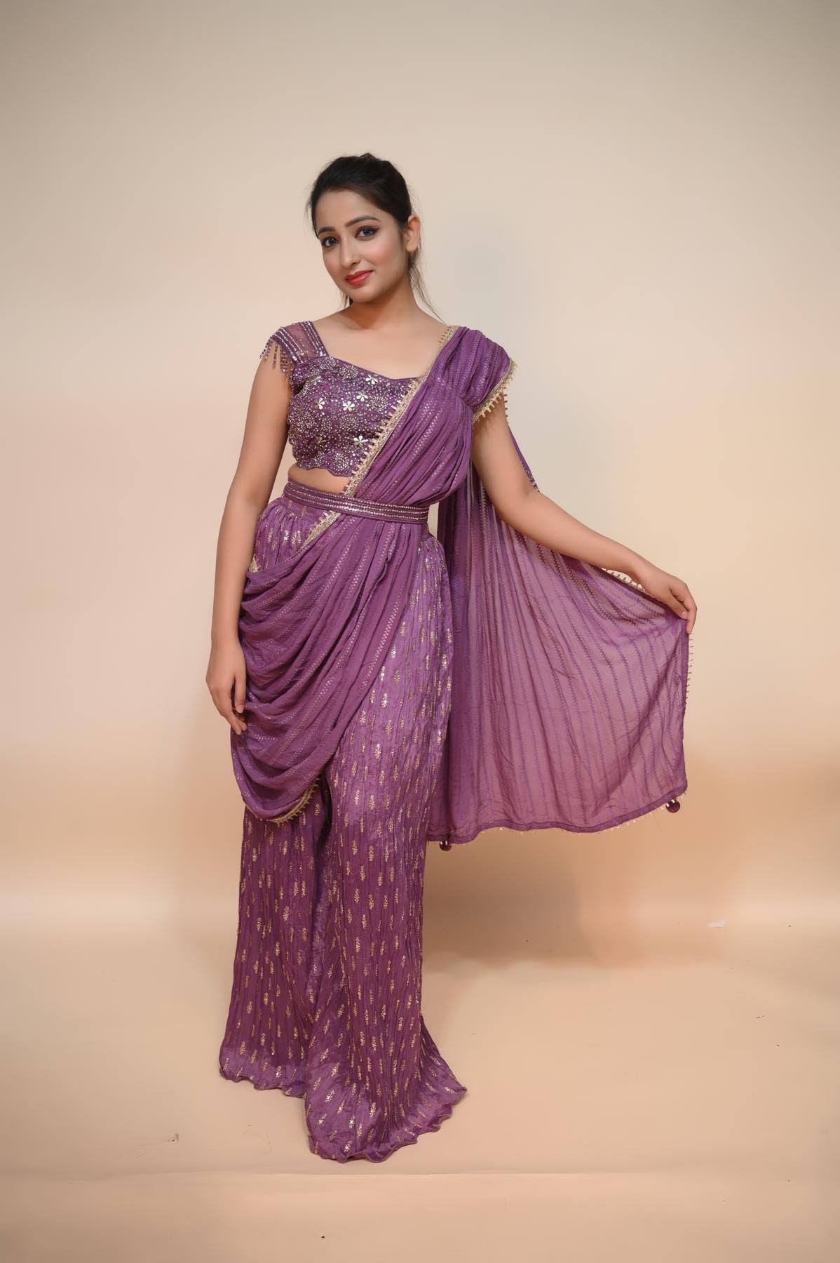 Elegant Purple Net Saree with Stone, Sequins, and Lace Embellishments