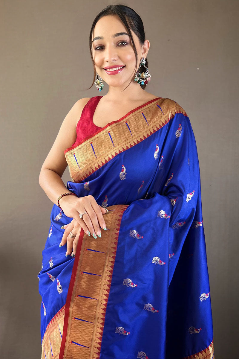 Desultory Royal Blue Paithani Silk Saree With Embrocation Blouse Piece