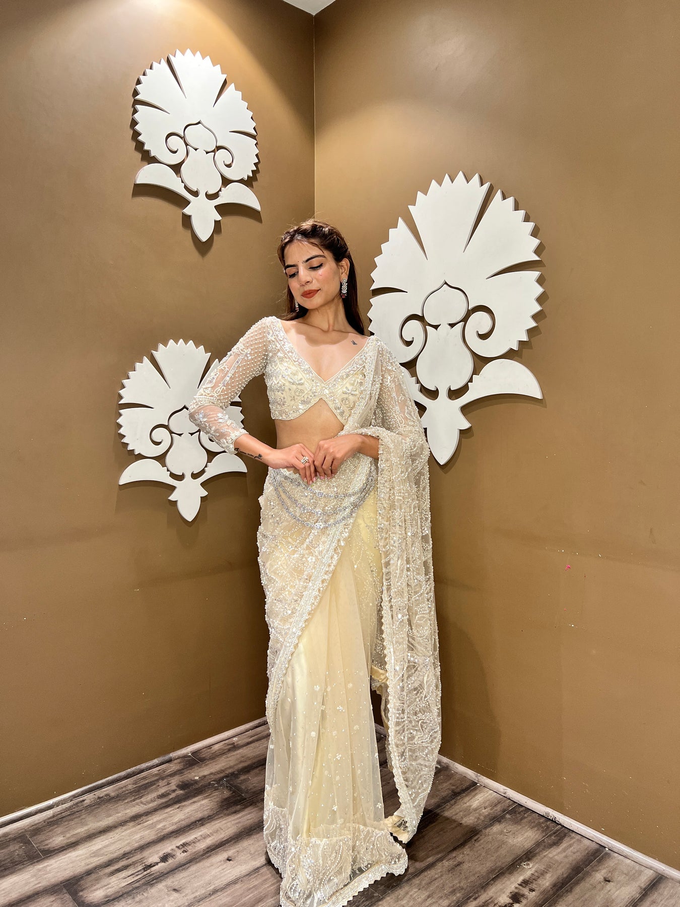 classy beige color floral motif embroidered saree