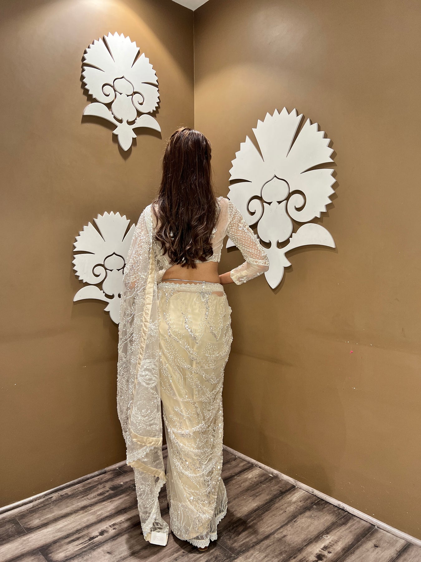 classy beige color floral motif embroidered saree