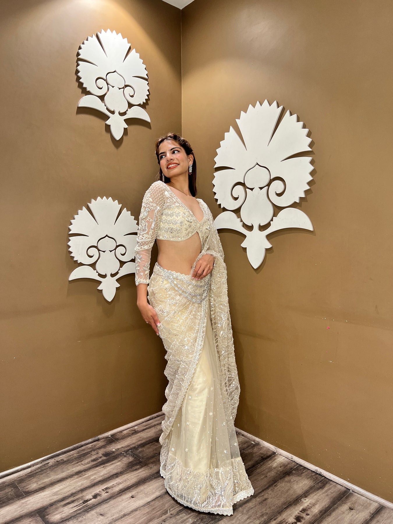 classy beige color floral motif embroidered saree