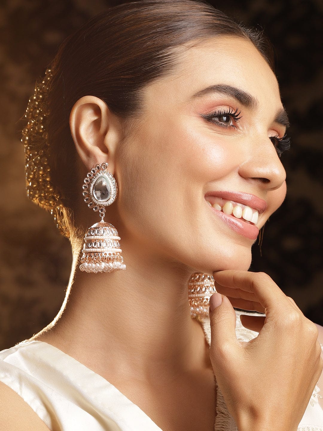 Rose gold plated kundan studded pearl beaded statment jhumka Earrings