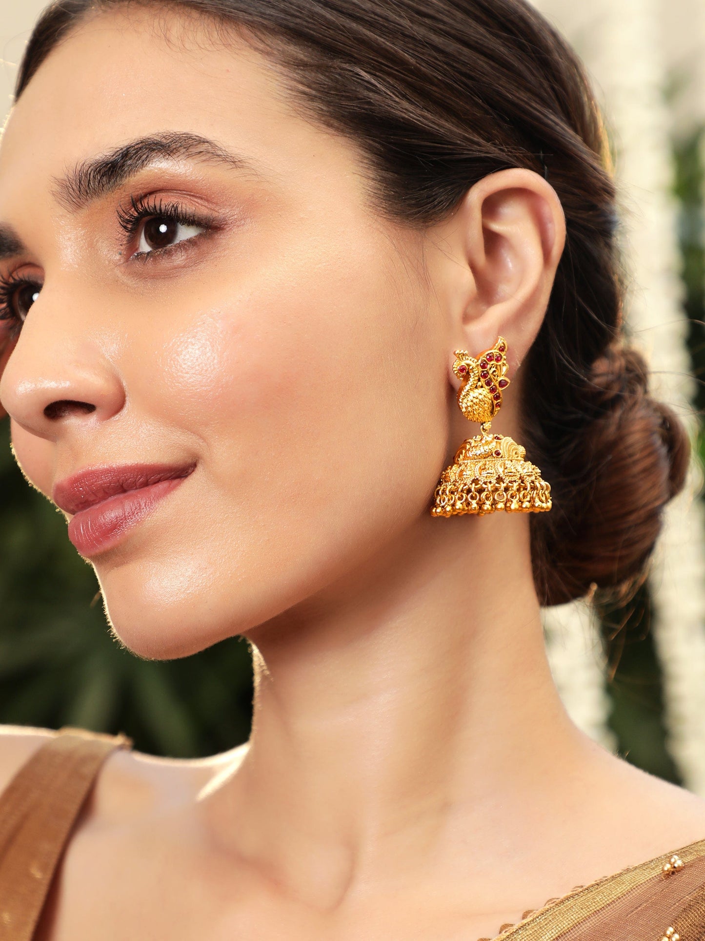 Celestial Plumage 22k Gold plated Jhumka Earrings with Peacock Charm