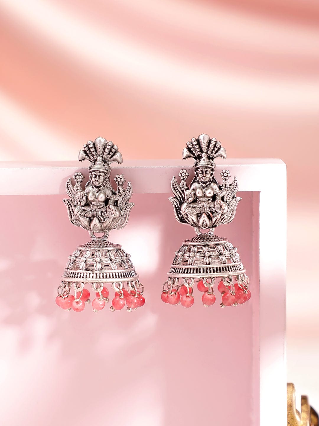 Oxidised Silver-Plated Coral Pink Beaded Goddess Laxmi Design Dome Shaped Jhumkas