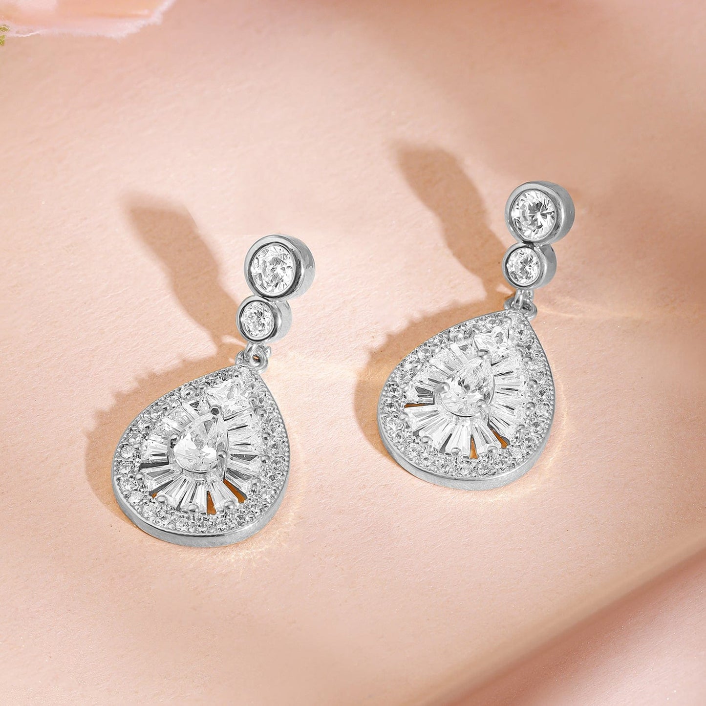 Rhodium-Plated Sparkling Cubic Zirconia Studded Radiant Teardrop Earrings