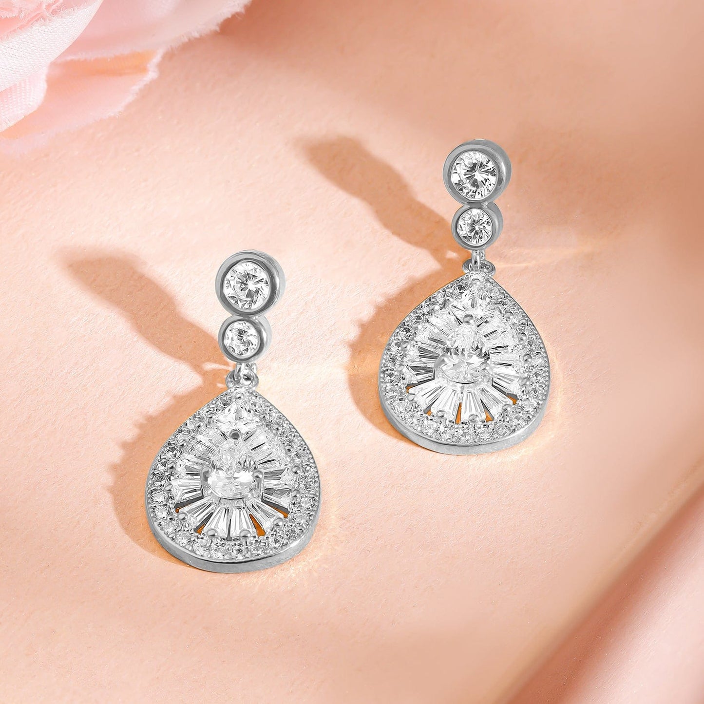 Rhodium-Plated Sparkling Cubic Zirconia Studded Radiant Teardrop Earrings